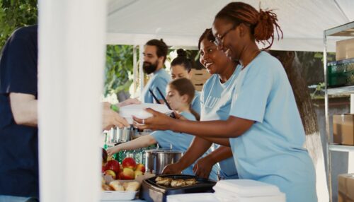 Volunteer team helping the homeless